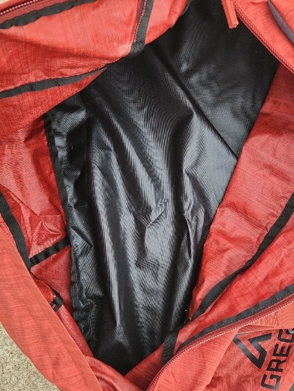 Gregory Red Stash 95 Travel Duffel with Black Accents